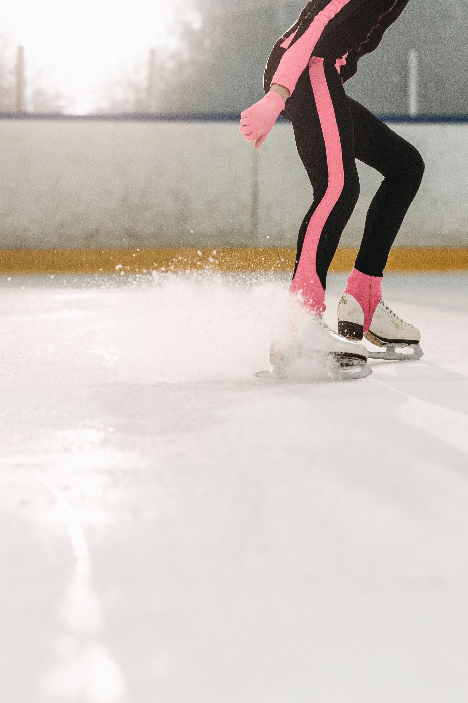 Figure skater in an arabesque on the ice